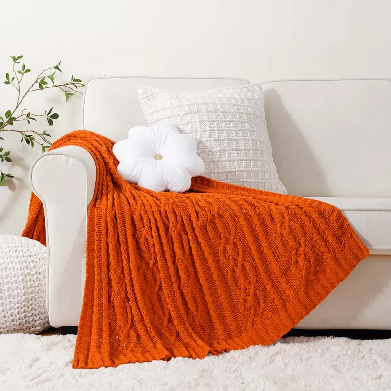 Battilo Home chenille knit throw blanket draped over a couch cushion