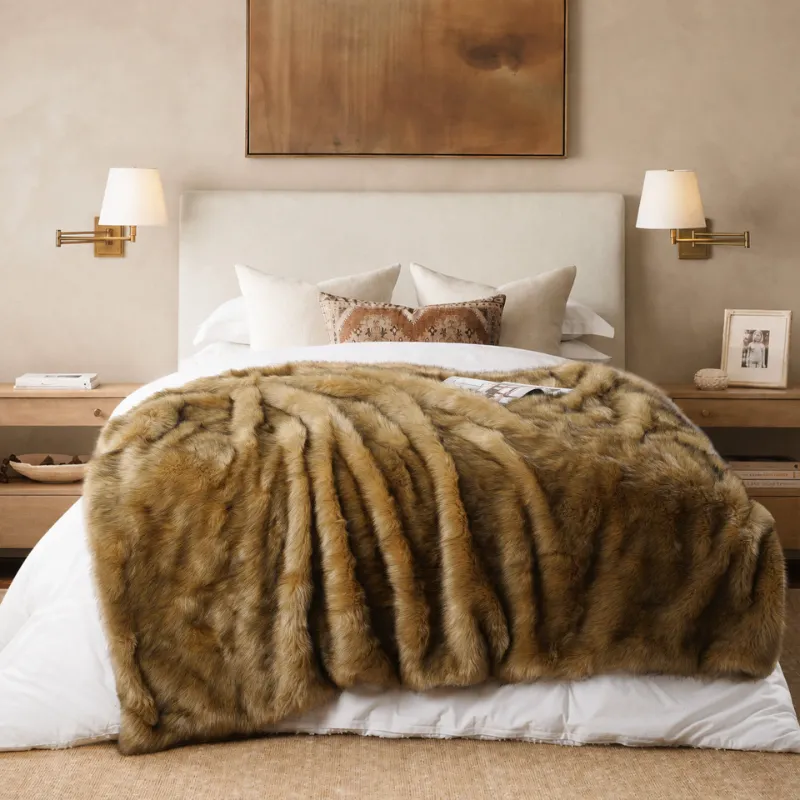 Battilo Home fluffy blanket piled high, showing its thick plush texture