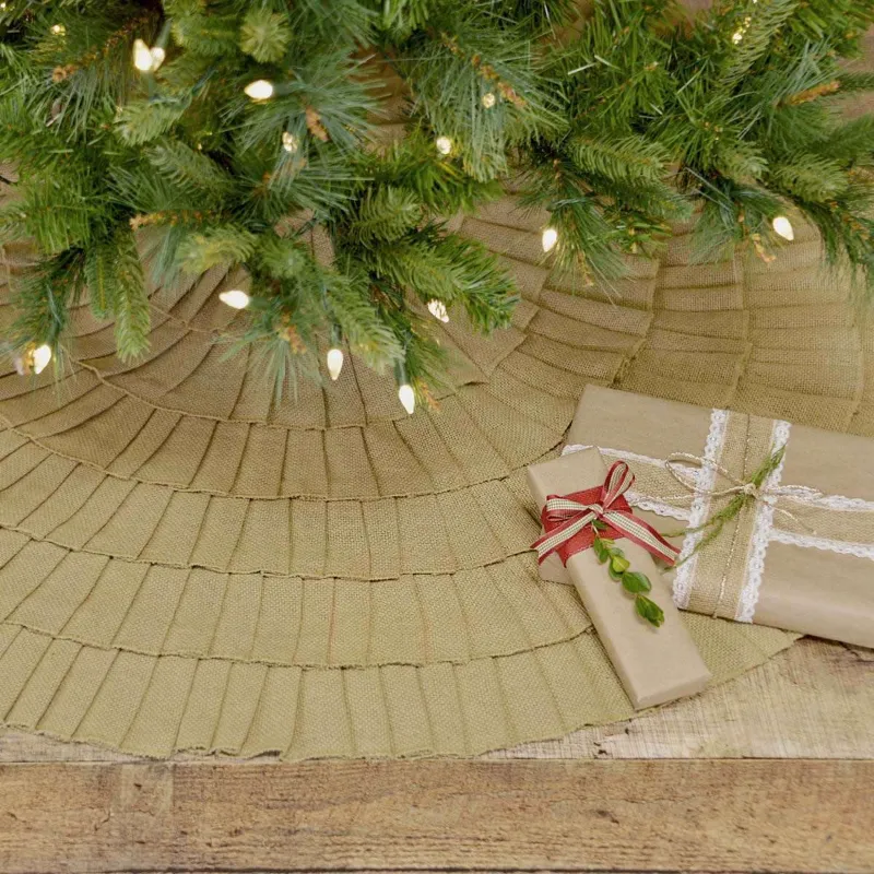 The Fox Decor tree skirt placed around a Christmas tree base